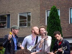 Coldplay, from left to right: Jonny Buckland, Will Champion, Chris Martin, and Guy Berryman