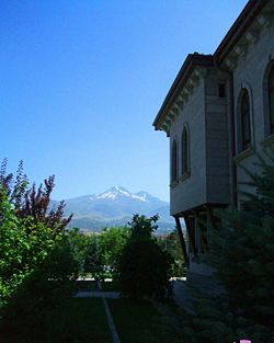 Traditional Kayseri house with Mount Erciyes in the background