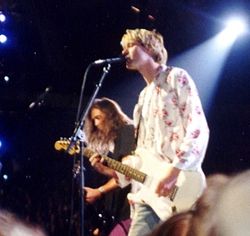 Cobain at the 1992 MTV Video Music Awards (right), with fellow band member Krist Novoselic (left)