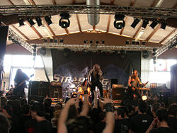 Strapping Young Lad in 2006, left to right: Byron Stroud, Gene Hoglan (back, drums), Devin Townsend and Jed Simon.