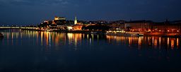 none Bratislava's Old Town in the evening, looking from Petržalka.