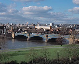 Nottingham and the River Trent seen from the bank of West Bridgford. The grey rectangle is the Derek Pavis stand of Meadow Lane, home to Notts County Football Club