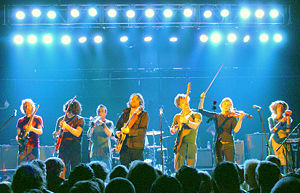 Broken Social Scene performing in England in 2006. Left to right: Brendan Canning, Ohad Benchetrit, James Shaw, Kevin Drew, Andrew Whiteman, Julie Penner, Lisa Lobsinger