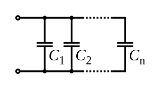 A diagram of several capacitors, side by side, both leads of each connected to the same wires