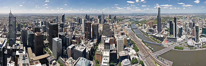 A ~180 degree panoramic image of Melbourne's Hoddle Grid (CBD) and Southbank on the right side, as viewed from the Rialto Observation Deck