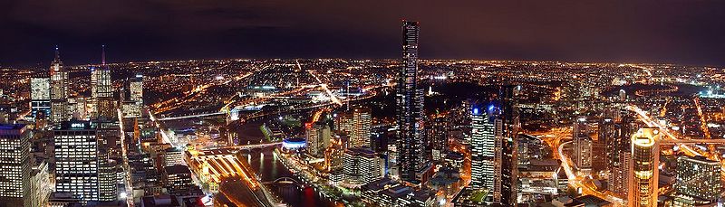 Panoramic view from the Rialto at night showing the CBD and Southbank lit up