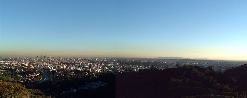 The Los Angeles Basin, looking south from Mulholland Drive. From left to right can be seen the San Gabriel Mountains (horizon), downtown L.A., West Hollywood, the Hollywood Bowl (foreground), West Los Angeles, Palos Verdes (background), Catalina Island (horizon), Santa Monica, and the Pacific Ocean.