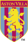 A crest with a yellow border and a yellow lion rampant facing to the left. The background is vertical claret and blue alternating stripes. At the bottom is the motto prepared written in yellow.