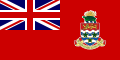 Red flag with multicoloured shield to right and Union Flag in top-left quarter.