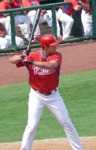 Pat Burrell standing at the plate holding a baseball bat