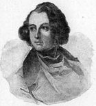 Engraved portrait of Dickens as a young man looking to his right. He has a large forehead and longish curly dark hair, parted on the right. He is wearing a jacket with wide lapels and an open front over a vest.