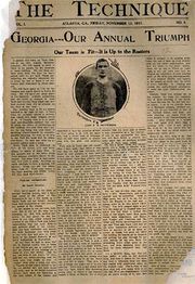 A newspaper front page with the headline, "Georgia--Our Annual Triumph", an image of a football player, and four columns of text