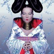 A picture of the album cover depicting a silver background with Björk standing facing forward in the middle. Björk is dressed in a outfit resembling a Kimono wearing large rings around her neck, silver fingernails and a large bun shaped hair style on each side of her head.