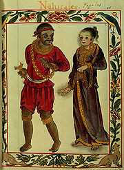 An elaborate border frames a full length illustration one would associate with a manuscript of a man and woman.  The dark-skinned man dressed in red tunic, breeches, and bandanna and wearing a gold chain is looking pleasantly over his shoulder in the direction of the fair woman who, garbed in a dark gold-fringed dress that covers the length of her body except her bare feet, has the faintest hints of a smile.