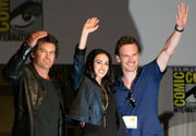 Megan Fox, with two others, waving