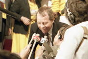 Colour photograph of former Federal Minister for Indian Affairs and Northern Development, the Honorable David Crombie speaking to reporters on the floor of the 1983 Progressive Conservative leadership convention