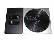 A black turntable with three buttons on the rotating deck.