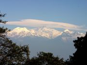 Snow-capped mountain peaks visible in the distance.