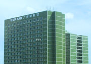 Multi-storey rectangular building with outlined windows; top floor is labeled 'EVA Air'.