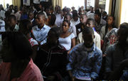 An image of a seated crowd of students at a seminar in Enugu