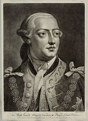 Head-and-shoulders monochrome portrait of a young clean-shaven man wearing a richly-patterned jacket, plain neckcloth, powdered wig, and the chain of office or livery collar of the Order of the Garter.