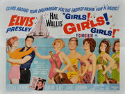 Movie poster with Presley on the left, holding a young woman around the waist, her arms draped over his shoulders. To the right, five young women wearing bathing suits and holding guitars stand in a row. The one in front taps Presley on the shoulder. Along with title and credits is the tagline "Climb aboard your dreamboat for the fastest-movin' fun 'n' music!"