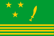 A rectangular flag with a green background, three horizontal yellow stripes across the bottom, three yellow stars forming a triangle on the top left, and a yellow sword on the top right.