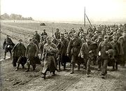 A photo of a crowd of marching Polish prisoners of war captured by the Red Army during the Soviet invasion of Poland