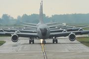 The front of several gray aircraft are centered in the image.