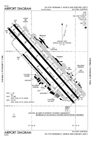 A map with a grid overlay showing the terminals, runways, and other structures of the airport.