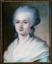 Portrait of a woman, showing her head, with a gray wig. Two large curls are sitting at the nape of her neck. Her shoulders are covered with a filmy, cream-colored shawl.