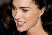 A close-up photograph of Megan Fox's face