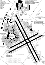 A map with a grid overlay showing the terminals runways and other structures of the airport.