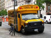 A Trans Tech school bus on a 2009-2010 Ford E-450 chassis