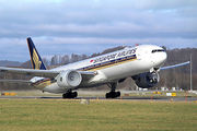 Aircraft takeoff. Front quarter view of jet lifting off, with wings flexed upwards, condensation in the engines, and the aft landing gear still touching the runway.