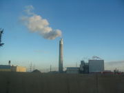 A smokestack releasing smoke