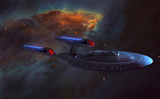 A spaceship glides out of a vibrant, multicolored nebula. The ship is composed of an saucer-shaped primary hull, connected to a thicker secondary hull. Paired glowing engines are attached to the secondary hull via swept-back struts.