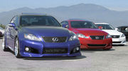 Three sedans parked outdoors.