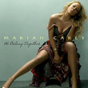 A blonde woman sitting in a chair in front of a light blue background, and wearing a patterned dress. "Mariah Carey" is written on her image in green font, with "We Belong Together" written in black, cursive font below it.