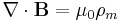 \nabla \cdot \mathbf{B} = \mu_0\rho_m 