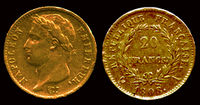 Photos of front and back of gold coin.