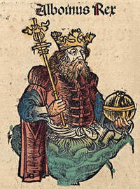 An image of a bearded man with a crown and a sceptre in one hand and a globe cruciger in the other