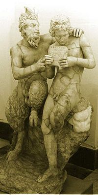 Pan teaching his eromenos, the shepherd Daphnis, to play the pipes, 2nd century AD Roman copy of Greek original ca. 100 BC, found in Pompeii