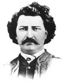 "Black and white bust shot of Louis Riel, after a carte de visite from 1884."