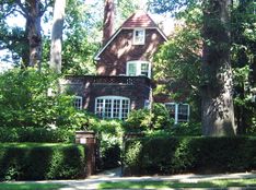 Larger, two-story house in leafy setting