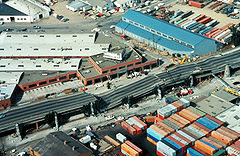 Image of collapsed double-decker freeway structure in Oakland, California