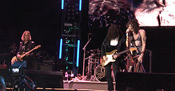 Left to right: Tom Hamilton (bass), Steven Tyler (vocals, percussion), Joey Kramer (drums), Brad Whitford (guitar), and Joe Perry (guitar)