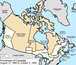 Map of the country of Canada on August 12, 1889, depicting the larger postage stamp sized province of Manitoba along with the provinces of Ontario, Prince Edward Island, Quebec (southern portion only), New Brunswick, British Columbia and Nova Scotia, in the colour white. The disputed area between Manitoba and Ontario is resolved, Ontario expands west to the Lake of the Woods and north to the Albany River. The Northwest Territories is separate from the District of Keewatin and additionally  the northern arctic islands are a part of the NWT.  The District of Keewatin now has a geographically shaped border to encompass the eastern borders of the newly formed provisional districts of the NWT. The area called Newfoundland, Labrador, and Alaska are depicted in bluish grey colour, and are not a part of Canada.