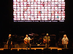 left to right: Graham Nash, Stephen Stills, Neil Young (not inducted with the band) and David Crosby