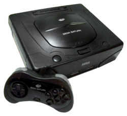 Sega Saturn console and controller